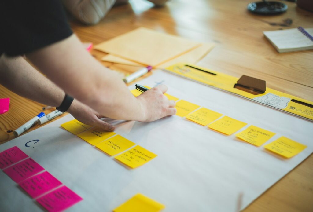 Business owner mapping out a growth strategy with a consultant in Alabama