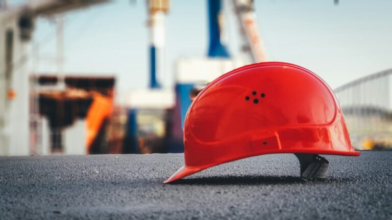 Hard hat on a job site representing strategic project consulting in Alabama